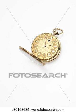 Golden pocket watch over white background View Large Photo Image Stock Photography - Golden pocket watch over white background. Fotosearch