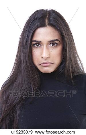 Portrait of pouting young woman against white background View Large Photo Image Stock Photo - Portrait of pouting young woman against white background. Fotosearch
