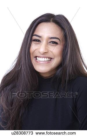 Portrait of Smiling young woman against white background View Large Photo Image Stock Image - Portrait of Smiling young woman against white background. Fotosearch