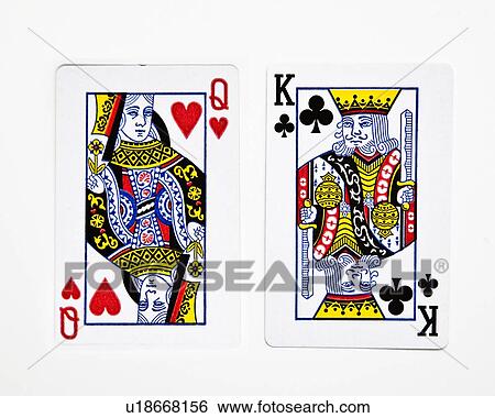 Stock Photograph - Queen of hearts and king of clubs against white background. Fotosearch