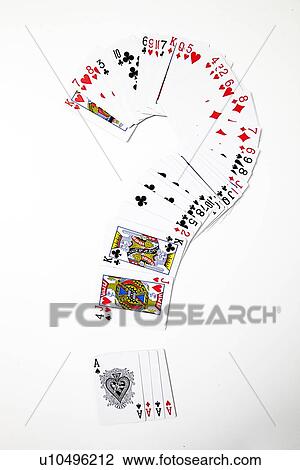 Stock Image - Question mark made up of playing cards over white background. Fotosearch