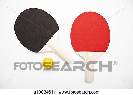 Table tennis paddles and ball over white background View Large Photo Image Stock Image - Table tennis paddles and ball over white background. Fotosearch