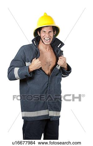 Young fireman tears his open jacket open View Large Photo Image Picture - Young fireman tears his open jacket open. Fotosearch
