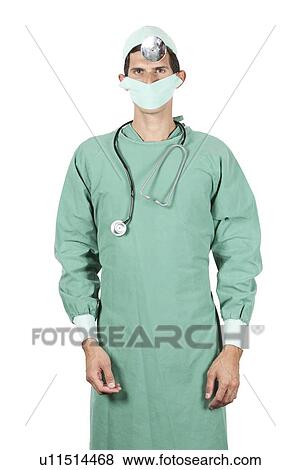 Young surgeon standing and looking at camera View Large Photo Image Stock Photo - Young surgeon standing and looking at camera. Fotosearch