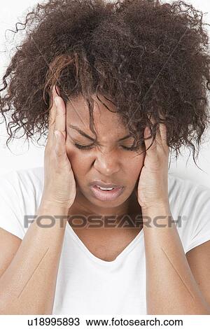 African American young woman suffering from headache View Large Photo Image Stock Image - African American young woman suffering from headache. Fotosearch