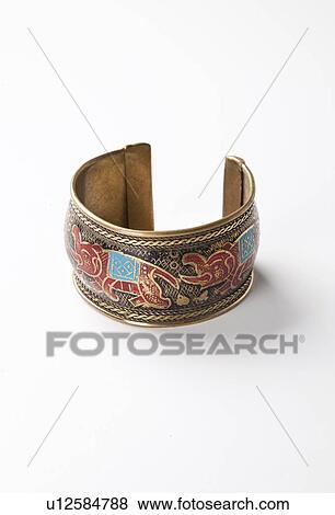 Stock Photo - Bracelet with print of elephants over white background. Fotosearch