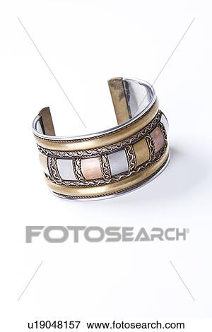 Close-up of a bracelet over white background View Large Photo Image Stock Photo - Close-up of a bracelet over white background. Fotosearch