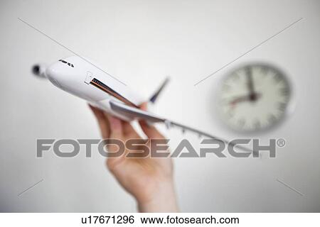 Close-up of hand holding model airplane View Large Photo Image Stock Photograph - Close-up of hand holding model airplane. Fotosearch