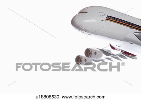 Close-up of model plane flying over white background View Large Photo Image Stock Image - Close-up of model plane flying over white background. Fotosearch