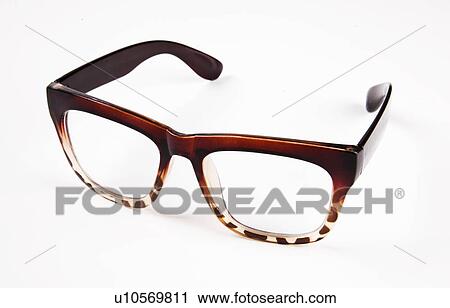 Close-up of reading glasses over white background View Large Photo Image Stock Image - Close-up of reading glasses over white background. Fotosearch