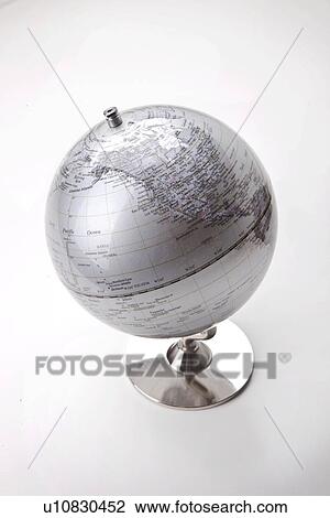 Close-up of silver globe over white background View Large Photo Image Stock Image - Close-up of silver globe over white background. Fotosearch