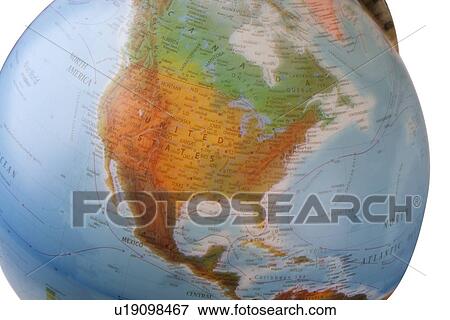 Stock Photo - Close-up of silver globe over white background. Fotosearch