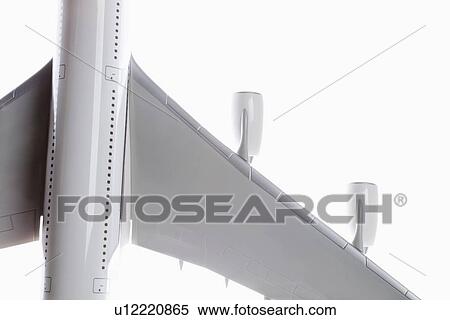 Close-up of toy airplane over white background View Large Photo Image Stock Photography - Close-up of toy airplane over white background. Fotosearch