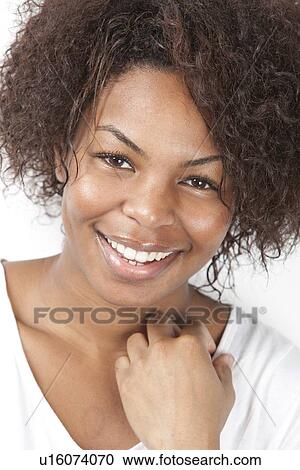 Close-up portrait of happy African American young woman View Large Photo Image Stock Image - Close-up portrait of happy African American young woman. Fotosearch