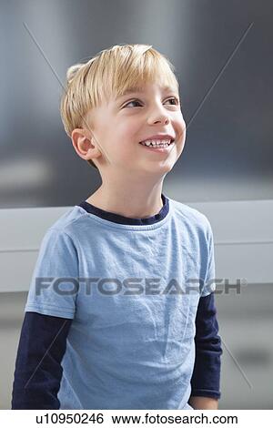 Cute Caucasian boy looking away View Large Photo Image Stock Photograph - Cute Caucasian boy looking away. Fotosearch
