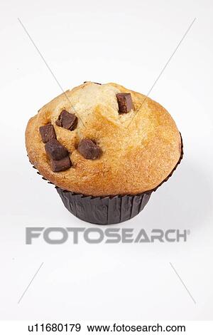 Freshly baked muffin over white background View Large Photo Image Stock Photo - Freshly baked muffin over white background. Fotosearch