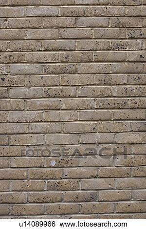 Stock Photograph - Full frame shot of brown brick wall. Fotosearch
