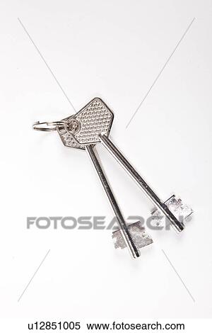 Metal safe keys with key ring on white background View Large Photo Image Stock Photography - Metal safe keys with key ring on white background. Fotosearch