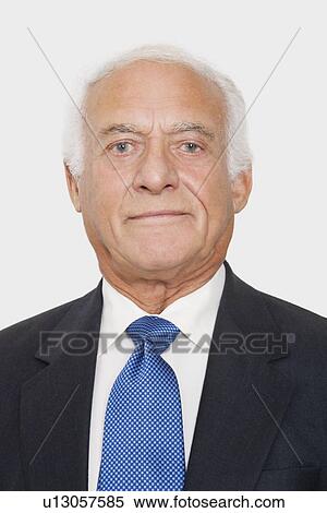 Portrait of confident elderly businessman against white background View Large Photo Image Stock Photography - Portrait of confident elderly businessman against white background. Fotosearch
