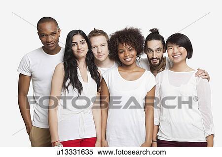 Portrait of young multi-ethnic friends smiling together over white background View Large Photo Image Stock Photography - Portrait of young multi-ethnic friends smiling together over white background. Fotosearch