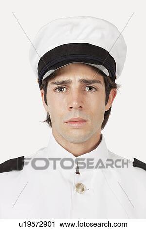Portrait of young sad navy officer against gray background View Large Photo Image Stock Image - Portrait of young sad navy officer against gray background. Fotosearch