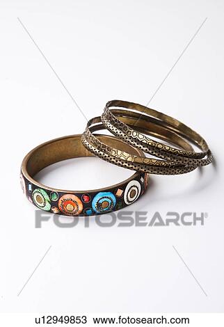 Stock Image - Traditional bangles over white background. Fotosearch