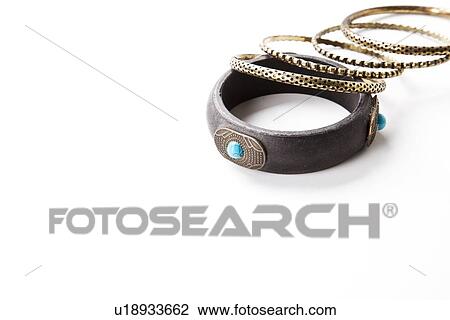 Stock Image - Traditional bangles over white background. Fotosearch
