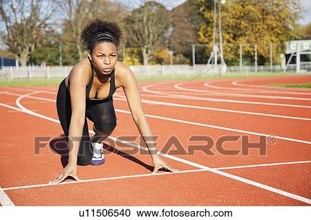 African American female runner at the starting line View Large Photo Image Stock Image - African American female runner at the starting line. Fotosearch