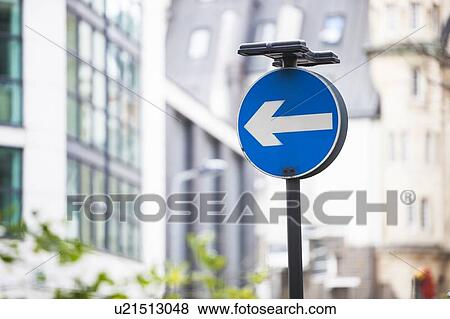 Arrow sign on street View Large Photo Image Stock Photo - Arrow sign on street. Fotosearch