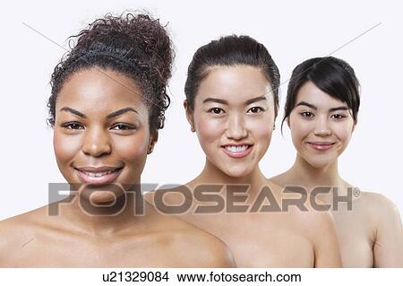 Beauty portrait of young multi-ethnic women over white background View Large Photo Image Picture - Beauty portrait of young multi-ethnic women over white background. Fotosearch