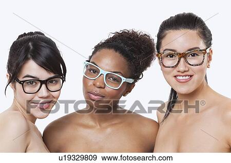Beauty portrait of young multi-ethnic women wearing glasses over white background View Large Photo Image Stock Photo - Beauty portrait of young multi-ethnic women wearing glasses over white background. Fotosearch
