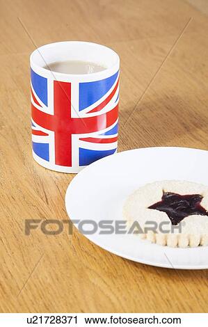 British coffee mug and cookie on plate View Large Photo Image Stock Image - British coffee mug and cookie on plate. Fotosearch