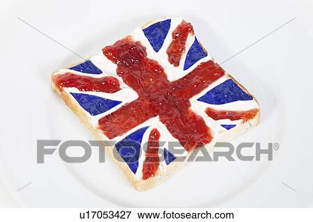 Stock Photo - British flag represented on bread over white background. Fotosearch