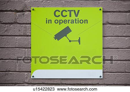 Close-up of 'CCTV in operation' sign on wall View Large Photo Image Stock Image - Close-up of 'CCTV in operation' sign on wall. Fotosearch