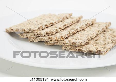 Close-up of crackers in plate View Large Photo Image Picture - Close-up of crackers in plate. Fotosearch
