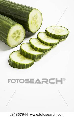 Close-up of cucumber with slices View Large Photo Image Picture - Close-up of cucumber with slices. Fotosearch