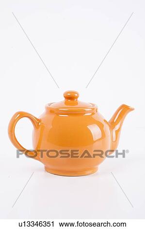 Close-up of orange kettle over white background View Large Photo Image Stock Image - Close-up of orange kettle over white background. Fotosearch