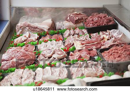 Close-up of trays of meat View Large Photo Image Stock Image - Close-up of trays of meat. Fotosearch
