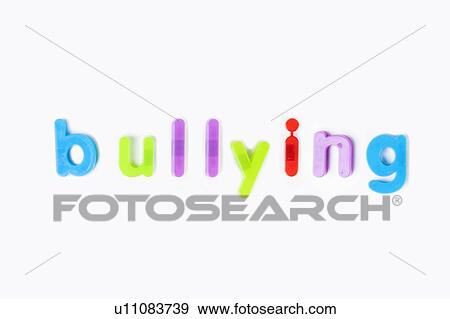 Colorful alphabet magnets spell 'bullying' over white background View Large Photo Image Stock Photo - Colorful alphabet magnets spell 'bullying' over white background. Fotosearch