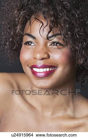 Extreme close-up of smiling young African American woman View Large Photo Image Picture - Extreme close-up of smiling young African American woman. Fotosearch