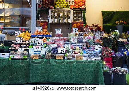 Fruits and flowers for sale at store View Large Photo Image Stock Photography - Fruits and flowers for sale at store. Fotosearch
