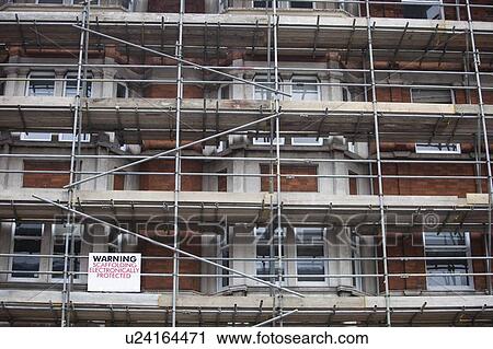 Low angle view of scaffolding View Large Photo Image Stock Image - Low angle view of scaffolding. Fotosearch