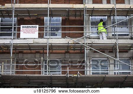 Low angle view of scaffolding View Large Photo Image Stock Photograph - Low angle view of scaffolding. Fotosearch