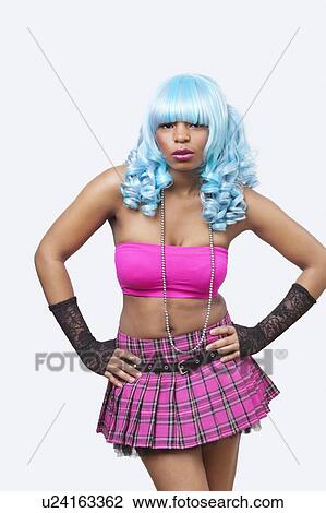 Portrait of cool young African American woman in blue wig over white background View Large Photo Image Stock Image - Portrait of cool young African American woman in blue wig over white background. Fotosearch