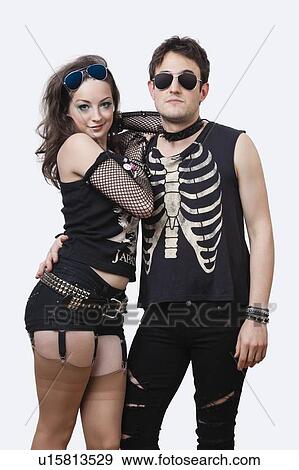 Portrait of gothic young couple over white background View Large Photo Image Stock Photo - Portrait of gothic young couple over white background. Fotosearch