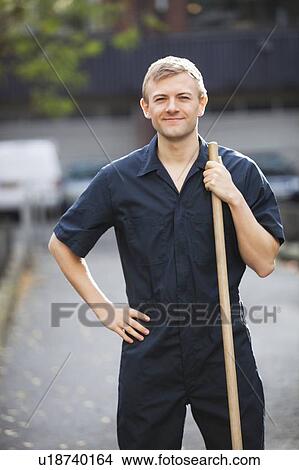 Portrait of young male street sweeper View Large Photo Image Picture - Portrait of young male street sweeper. Fotosearch