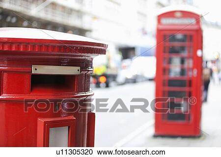Red telephone booth and mail box View Large Photo Image Stock Image - Red telephone booth and mail box. Fotosearch