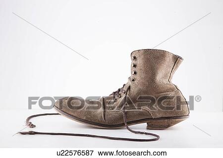 Side view of a vintage boot white background View Large Photo Image Stock Photo - Side view of a vintage boot white background. Fotosearch