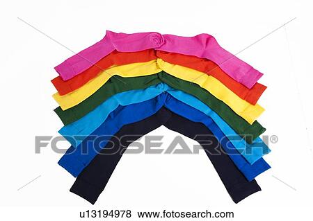 Stock Photo - Stack of colorful socks over white background. Fotosearch