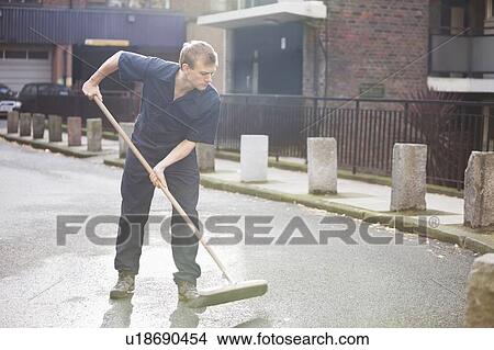 Young male street sweeper View Large Photo Image Picture - Young male street sweeper. Fotosearch